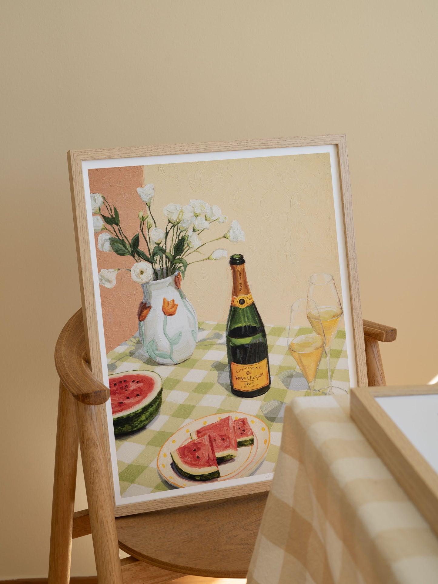 Vibrant still life print 'Celebrating Summer' featuring a festive table scene with champagne, fruits, and flowers. Colorful, textured art print perfect for adding warmth and joy to any room. Hand-signed, open edition print on matte 200 gsm photo paper.