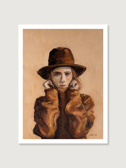 Art print featuring a woman in a cozy brown sweater and hat.