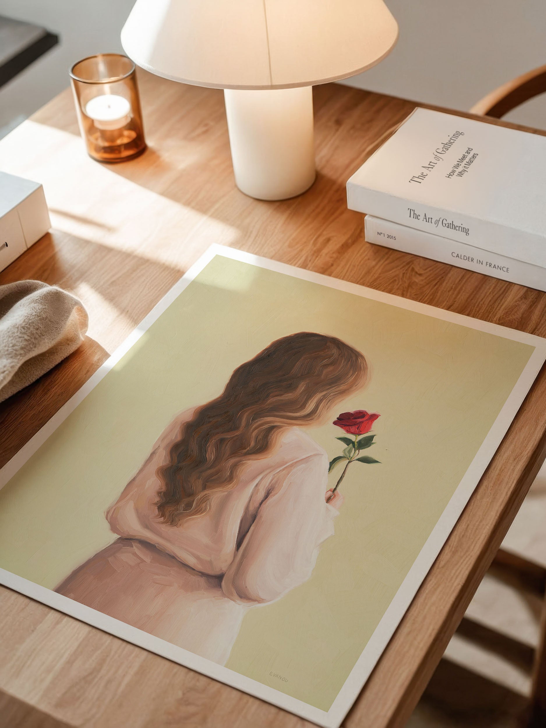 Back view of a woman holding a red rose in an art print from the original oil painting "Girl With A Rose", perfect for adding charm to your home decor.