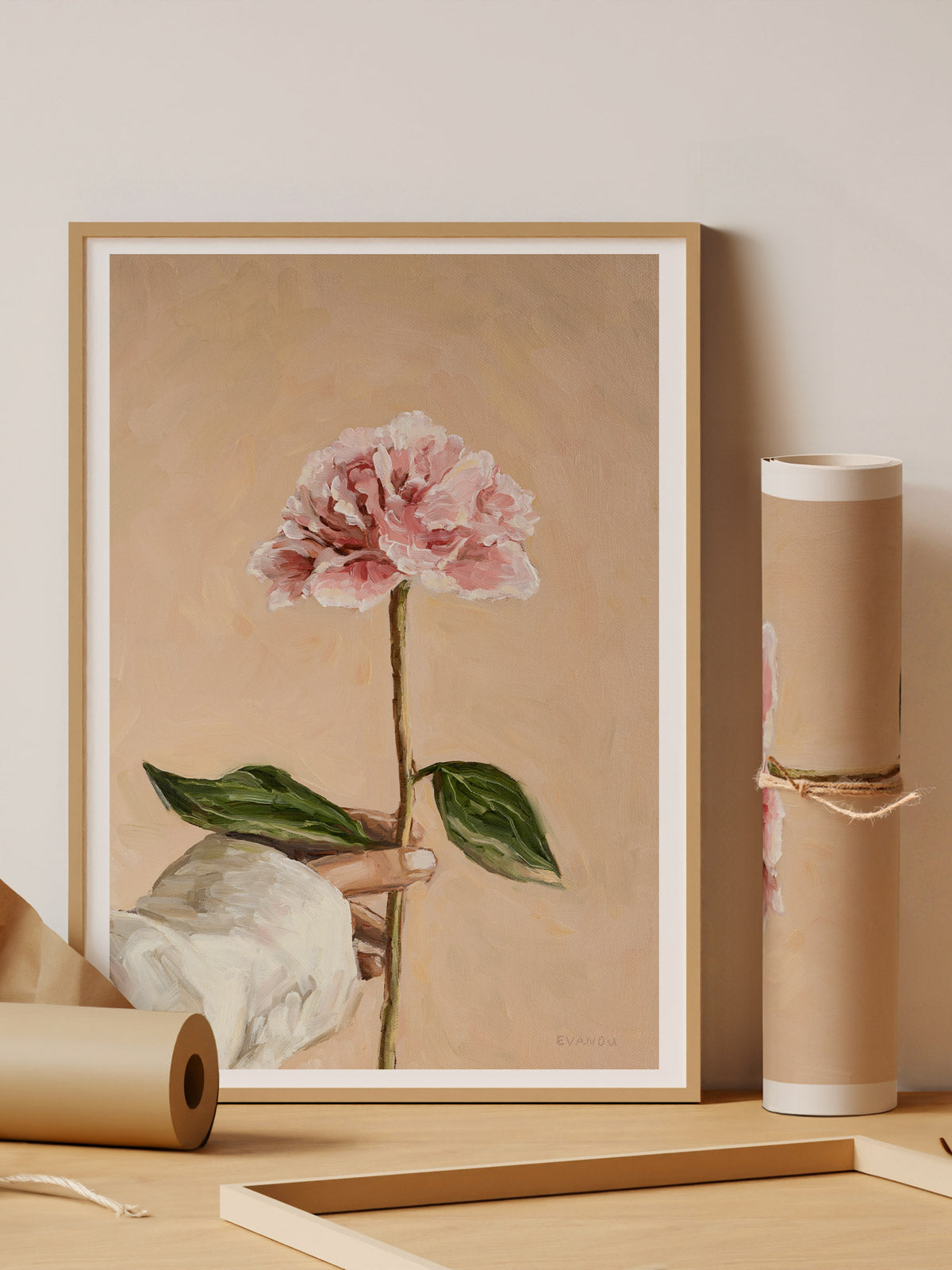 Art print picturing a hand holding a peony flower.