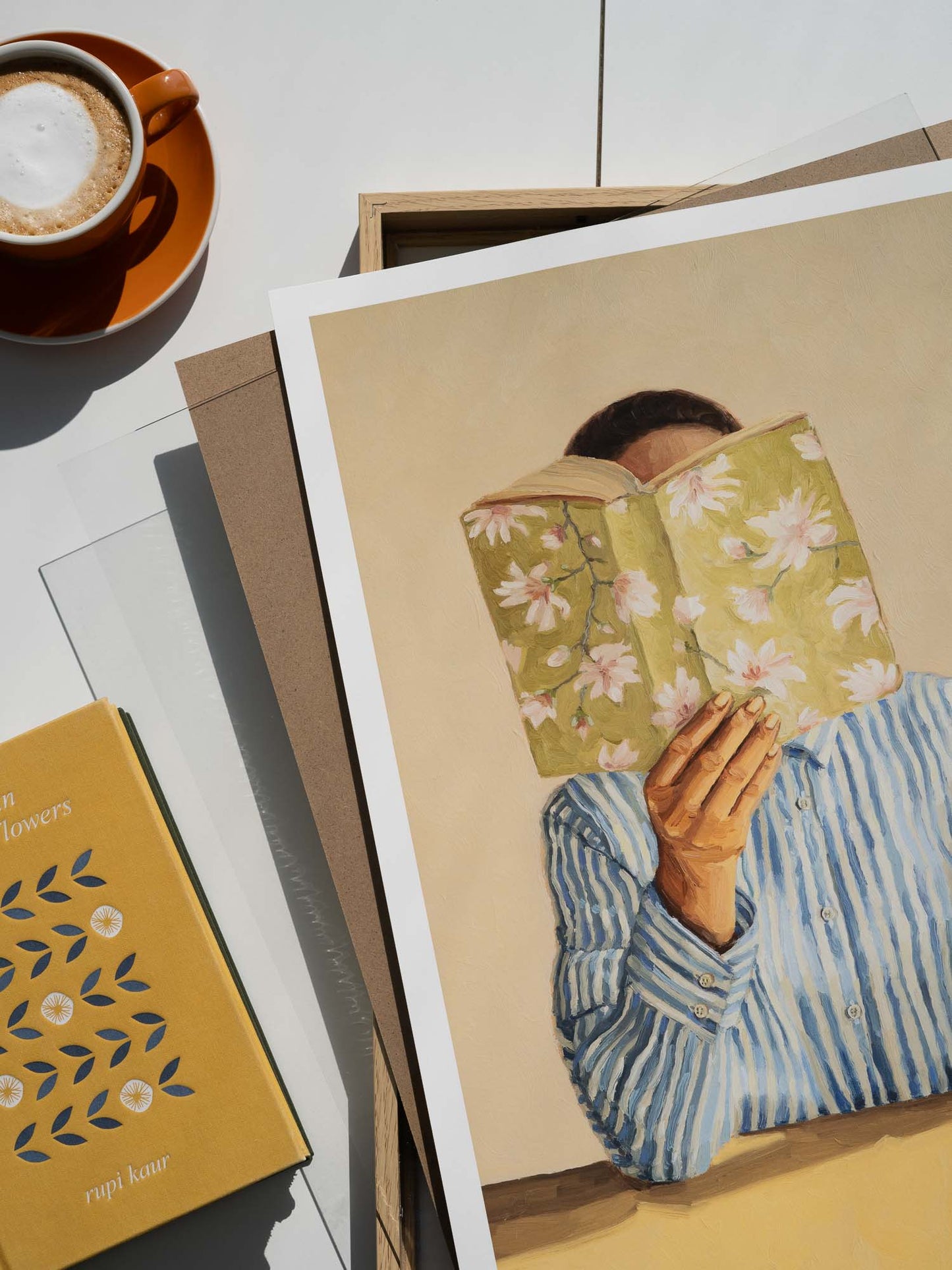 art print of a woman reading a book