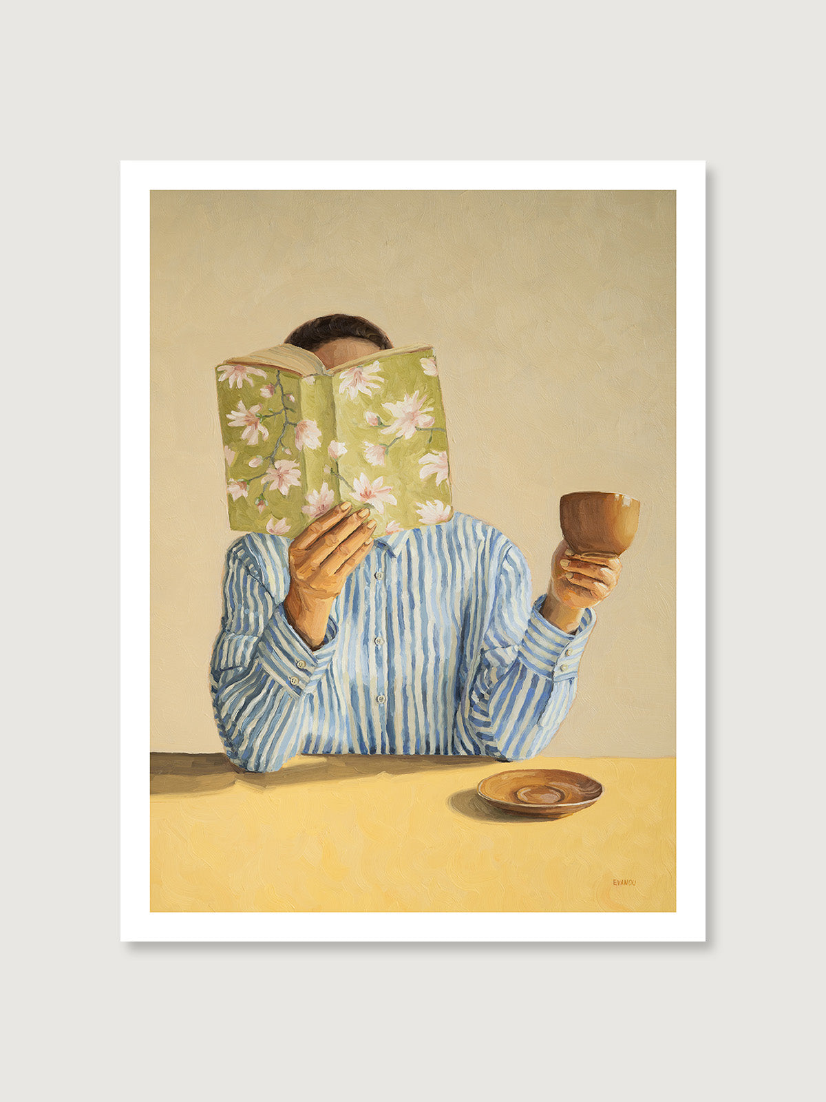 art print featuring a woman reading a book and holding a cup